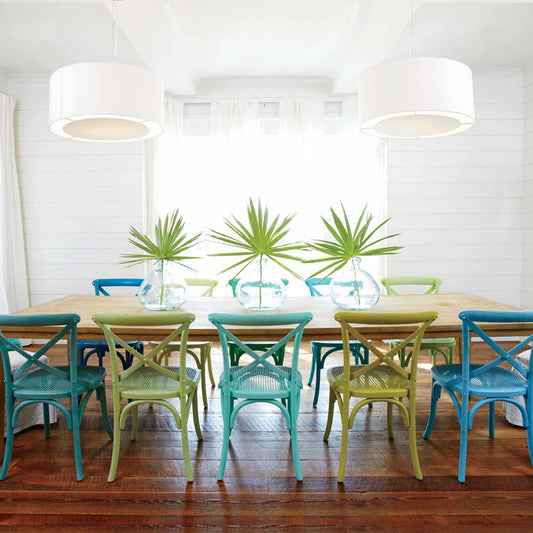 Eclectic Elegance: Dining Room Table with Different Colored Chairs